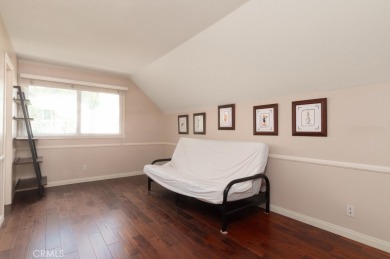 Step inside to find two expansive living areas, a large kitchen on Friendly Hills Country Club in California - for sale on GolfHomes.com, golf home, golf lot