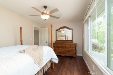 Step inside to find two expansive living areas, a large kitchen on Friendly Hills Country Club in California - for sale on GolfHomes.com, golf home, golf lot