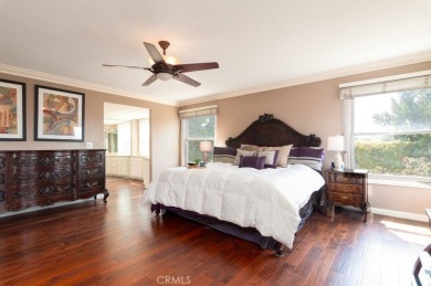 Step inside to find two expansive living areas, a large kitchen on Friendly Hills Country Club in California - for sale on GolfHomes.com, golf home, golf lot