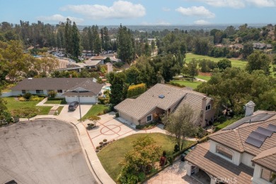 Step inside to find two expansive living areas, a large kitchen on Friendly Hills Country Club in California - for sale on GolfHomes.com, golf home, golf lot
