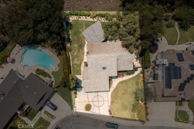 Step inside to find two expansive living areas, a large kitchen on Friendly Hills Country Club in California - for sale on GolfHomes.com, golf home, golf lot