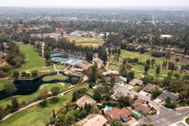 Step inside to find two expansive living areas, a large kitchen on Friendly Hills Country Club in California - for sale on GolfHomes.com, golf home, golf lot