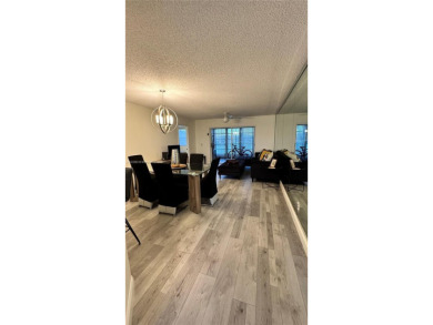 Call this your new home in a spacious and updated furnished on Sunrise Lakes Phase IV Golf Course in Florida - for sale on GolfHomes.com, golf home, golf lot
