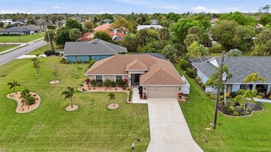 Beautifully maintained 4-bedroom, 2-bath pool home situated on a on Deep Creek Golf Club in Florida - for sale on GolfHomes.com, golf home, golf lot