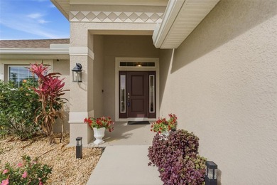 Beautifully maintained 4-bedroom, 2-bath pool home situated on a on Deep Creek Golf Club in Florida - for sale on GolfHomes.com, golf home, golf lot