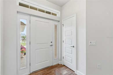 Beautifully maintained 4-bedroom, 2-bath pool home situated on a on Deep Creek Golf Club in Florida - for sale on GolfHomes.com, golf home, golf lot