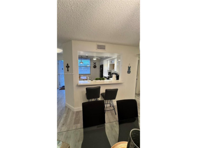 Call this your new home in a spacious and updated furnished on Sunrise Lakes Phase IV Golf Course in Florida - for sale on GolfHomes.com, golf home, golf lot