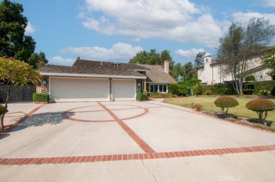 Step inside to find two expansive living areas, a large kitchen on Friendly Hills Country Club in California - for sale on GolfHomes.com, golf home, golf lot