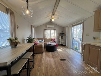 Welcome to Lake Life! This 1990 one bed/bath Park Model has been on Old North State Club at Uwharrie Point Golf community in North Carolina - for sale on GolfHomes.com, golf home, golf lot