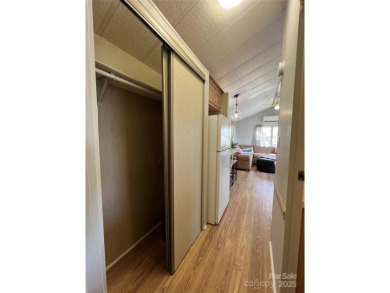Welcome to Lake Life! This 1990 one bed/bath Park Model has been on Old North State Club at Uwharrie Point Golf community in North Carolina - for sale on GolfHomes.com, golf home, golf lot