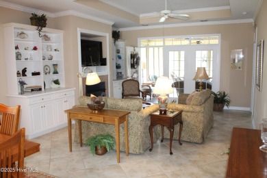 Welcome to your dream home! This custom-built residence is on Ocean Ridge Plantation in North Carolina - for sale on GolfHomes.com, golf home, golf lot