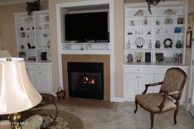 Welcome to your dream home! This custom-built residence is on Ocean Ridge Plantation in North Carolina - for sale on GolfHomes.com, golf home, golf lot