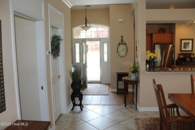 Welcome to your dream home! This custom-built residence is on Ocean Ridge Plantation in North Carolina - for sale on GolfHomes.com, golf home, golf lot