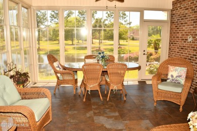 Welcome to your dream home! This custom-built residence is on Ocean Ridge Plantation in North Carolina - for sale on GolfHomes.com, golf home, golf lot