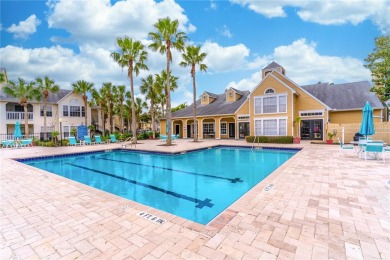 Overlooking the community POOL and HOT TUB, this condo offers on MetroWest Golf Club in Florida - for sale on GolfHomes.com, golf home, golf lot