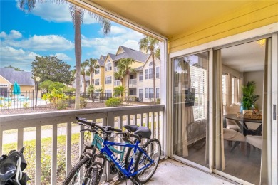 Overlooking the community POOL and HOT TUB, this condo offers on MetroWest Golf Club in Florida - for sale on GolfHomes.com, golf home, golf lot