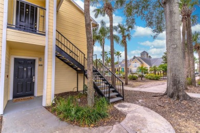 Overlooking the community POOL and HOT TUB, this condo offers on MetroWest Golf Club in Florida - for sale on GolfHomes.com, golf home, golf lot