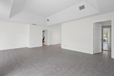 New price on this golf course 3-bedroom! Priced below comparable on Monarch Country Club in Florida - for sale on GolfHomes.com, golf home, golf lot