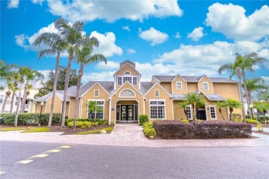 Overlooking the community POOL and HOT TUB, this condo offers on MetroWest Golf Club in Florida - for sale on GolfHomes.com, golf home, golf lot