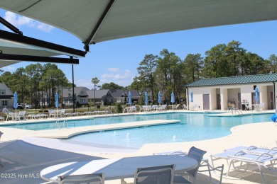 Welcome to your dream home! This custom-built residence is on Ocean Ridge Plantation in North Carolina - for sale on GolfHomes.com, golf home, golf lot