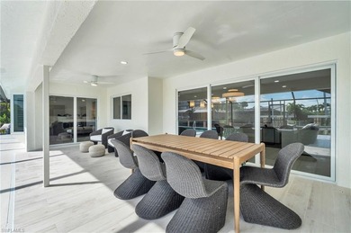 BOATER'S DELIGHT! STUNNING DESIGNER-REMODELED GULF-ACCESS POOL on Fort Myers Beach and Golf Club in Florida - for sale on GolfHomes.com, golf home, golf lot