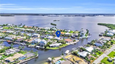 BOATER'S DELIGHT! STUNNING DESIGNER-REMODELED GULF-ACCESS POOL on Fort Myers Beach and Golf Club in Florida - for sale on GolfHomes.com, golf home, golf lot