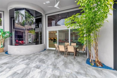 This is unbeatable Boca value! Oversized 17,049 SF lot + newer on Woodfield Country Club in Florida - for sale on GolfHomes.com, golf home, golf lot