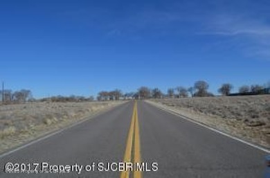 Commercial Land. Nice Corner Lot at the intersection of US 64 on Riverview Golf Course in New Mexico - for sale on GolfHomes.com, golf home, golf lot