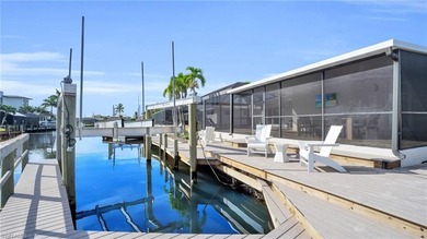 STUNNING NEWLY REMODELED GULF-ACCESS CANAL HOME WITH POOL & on Fort Myers Beach and Golf Club in Florida - for sale on GolfHomes.com, golf home, golf lot