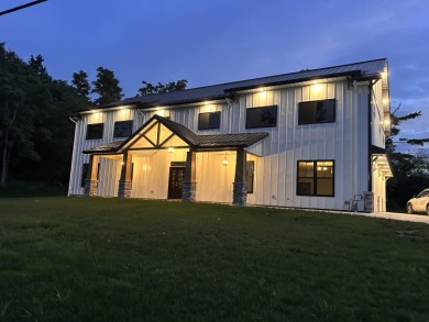 Welcome to this brand new, stunning, sleek, contemporary home on Hillsdale Golf and Country Club in Michigan - for sale on GolfHomes.com, golf home, golf lot