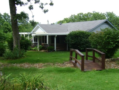 GOLF COURSE house with a great view of the course and club house on The Course At Turkey Mountain in Arkansas - for sale on GolfHomes.com, golf home, golf lot