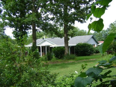GOLF COURSE house with a great view of the course and club house on The Course At Turkey Mountain in Arkansas - for sale on GolfHomes.com, golf home, golf lot