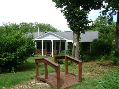 GOLF COURSE house with a great view of the course and club house on The Course At Turkey Mountain in Arkansas - for sale on GolfHomes.com, golf home, golf lot