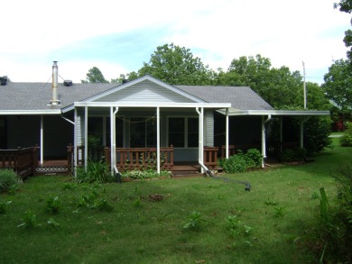 GOLF COURSE house with a great view of the course and club house on The Course At Turkey Mountain in Arkansas - for sale on GolfHomes.com, golf home, golf lot