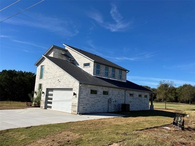 New construction home offers exquisite layout home has four on White Bluff Resort - New Course in Texas - for sale on GolfHomes.com, golf home, golf lot