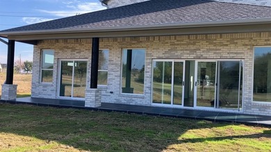 New construction home offers exquisite layout home has four on White Bluff Resort - New Course in Texas - for sale on GolfHomes.com, golf home, golf lot