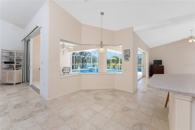 Poolside Paradise in Rotonda West - Canal Views + Access to 5 on Rotonda Golf and Country Club - Long Marsh  in Florida - for sale on GolfHomes.com, golf home, golf lot