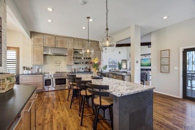 Welcome to 489 S Pin High Dr, a one-of-a-kind custom home on Desert Hawk At Pueblo West in Colorado - for sale on GolfHomes.com, golf home, golf lot