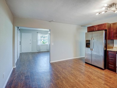 Location! Location! This fully remodeled 3 bedroom 2 bath home on The Dunedin Country Club in Florida - for sale on GolfHomes.com, golf home, golf lot