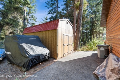 Pine trees, Mountains, Custom log home. True Wyo setting. 2 Wood on Star Valley RV Golf Course in Wyoming - for sale on GolfHomes.com, golf home, golf lot