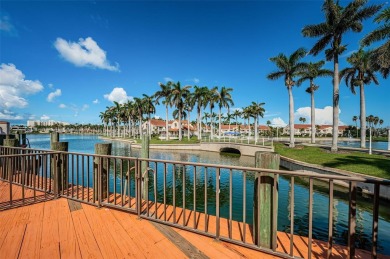Find paradise in this one-of-a-kind lakefront villa in beautiful on Isla Del Sol Yacht and Country Club in Florida - for sale on GolfHomes.com, golf home, golf lot