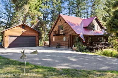 Pine trees, Mountains, Custom log home. True Wyo setting. 2 Wood on Star Valley RV Golf Course in Wyoming - for sale on GolfHomes.com, golf home, golf lot