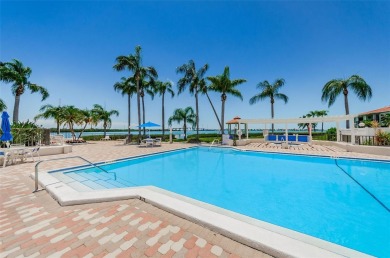 Find paradise in this one-of-a-kind lakefront villa in beautiful on Isla Del Sol Yacht and Country Club in Florida - for sale on GolfHomes.com, golf home, golf lot