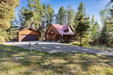 Pine trees, Mountains, Custom log home. True Wyo setting. 2 Wood on Star Valley RV Golf Course in Wyoming - for sale on GolfHomes.com, golf home, golf lot