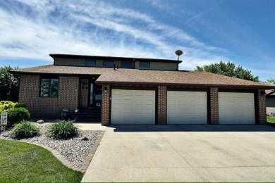 Experience luxury living in this stunning 4 bedroom, 4 bath home on Fort Dodge Country Club in Iowa - for sale on GolfHomes.com, golf home, golf lot