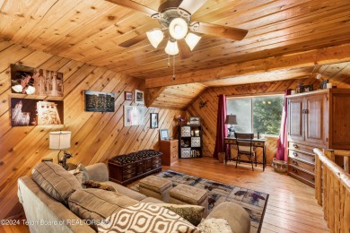 Pine trees, Mountains, Custom log home. True Wyo setting. 2 Wood on Star Valley RV Golf Course in Wyoming - for sale on GolfHomes.com, golf home, golf lot