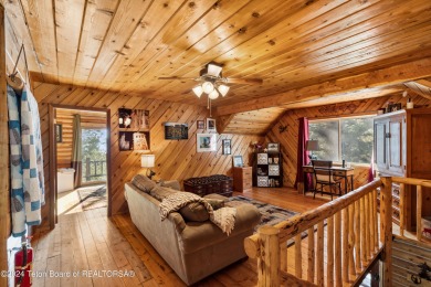 Pine trees, Mountains, Custom log home. True Wyo setting. 2 Wood on Star Valley RV Golf Course in Wyoming - for sale on GolfHomes.com, golf home, golf lot