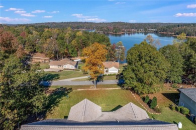 Make lake living yours.  Enjoy the tranquil all-year lake view on Chickasaw Point Golf Course in Georgia - for sale on GolfHomes.com, golf home, golf lot