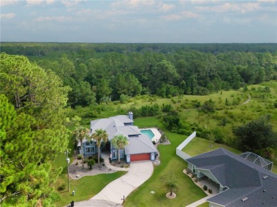 A rare find in Palm Coast, this 4-bedroom, 3-bath, 2,764 sq ft on Grand Club Matanzas in Florida - for sale on GolfHomes.com, golf home, golf lot
