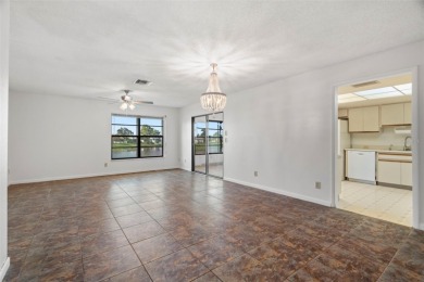 RARE, POND VILLA UNIT AVAILABLE! BEAUTIFUL WATER VIEWS! MOVE-IN on Mainlands Golf Club in Florida - for sale on GolfHomes.com, golf home, golf lot